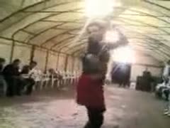 A gorgeous Arab kid of legal age dances in public with her stomach on a camera.